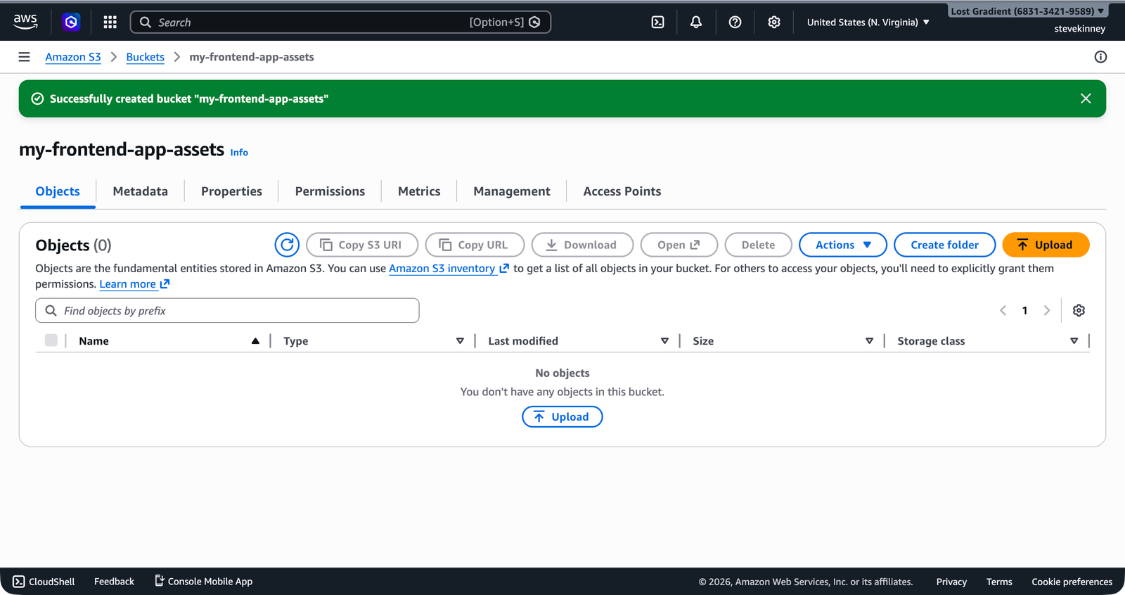 The S3 bucket detail page showing a green Successfully created bucket banner at the top with the bucket name and region displayed.