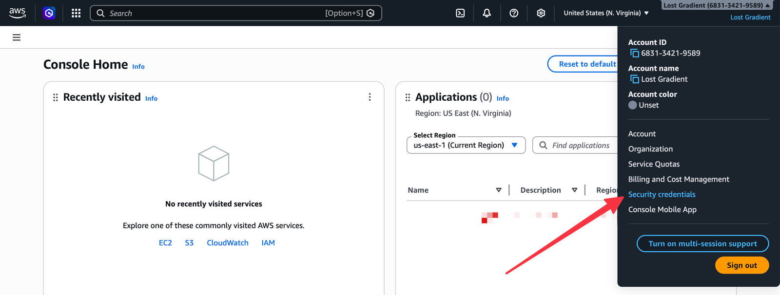Account menu in the AWS console with Security credentials highlighted.