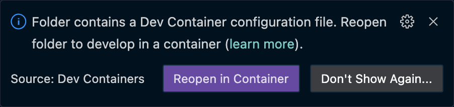 Visual Studio Code dialog showing option to reopen in container