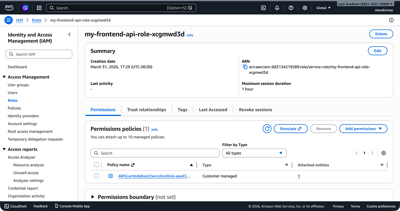 The IAM role detail page showing the AWSLambdaBasicExecutionRole policy attached in the Permissions policies section.