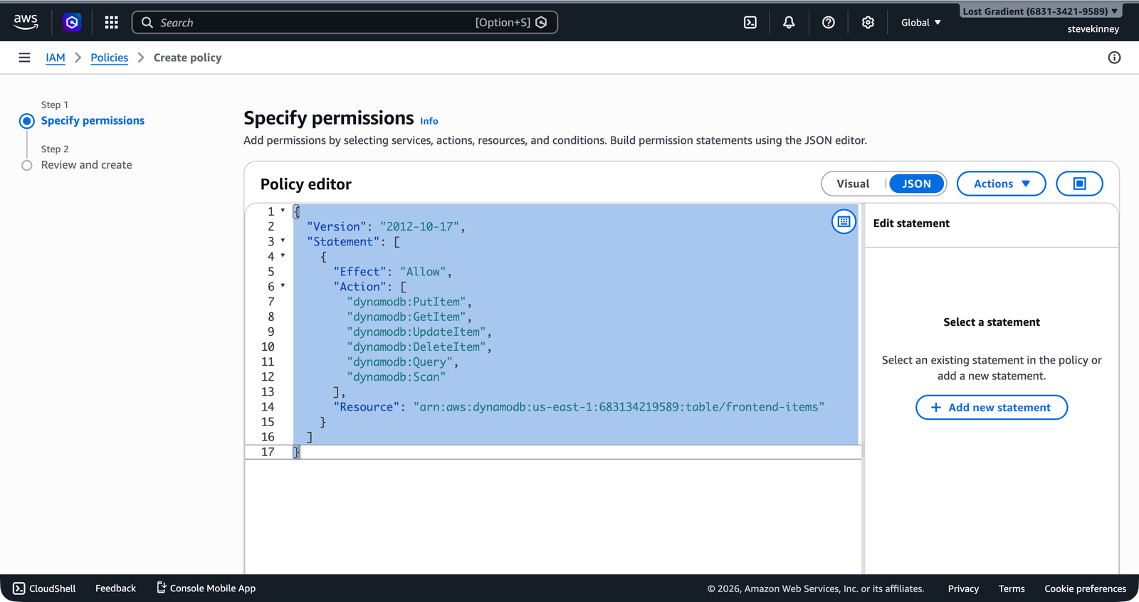 The IAM Create Policy JSON editor showing a policy with DynamoDB actions including PutItem, GetItem, UpdateItem, and Query scoped to a specific table ARN.